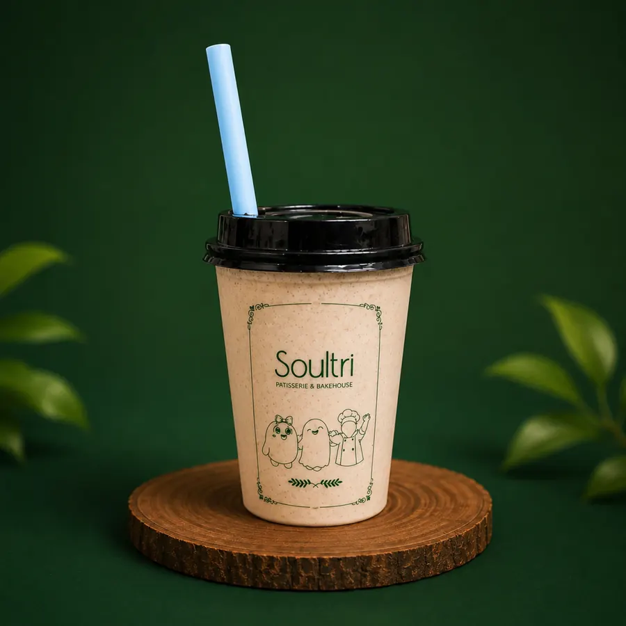 Soultri milkshake cup with a blue straw